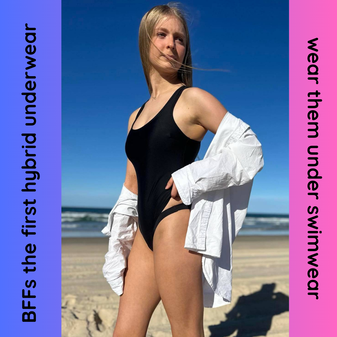 Teen girl on beach showing her period underwear under her one piece